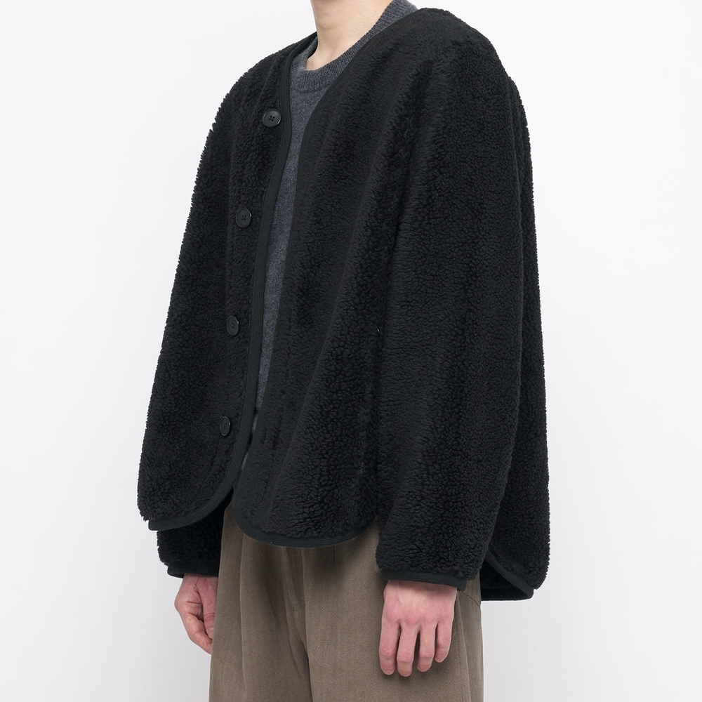 7115 By Szeki Curly Coat